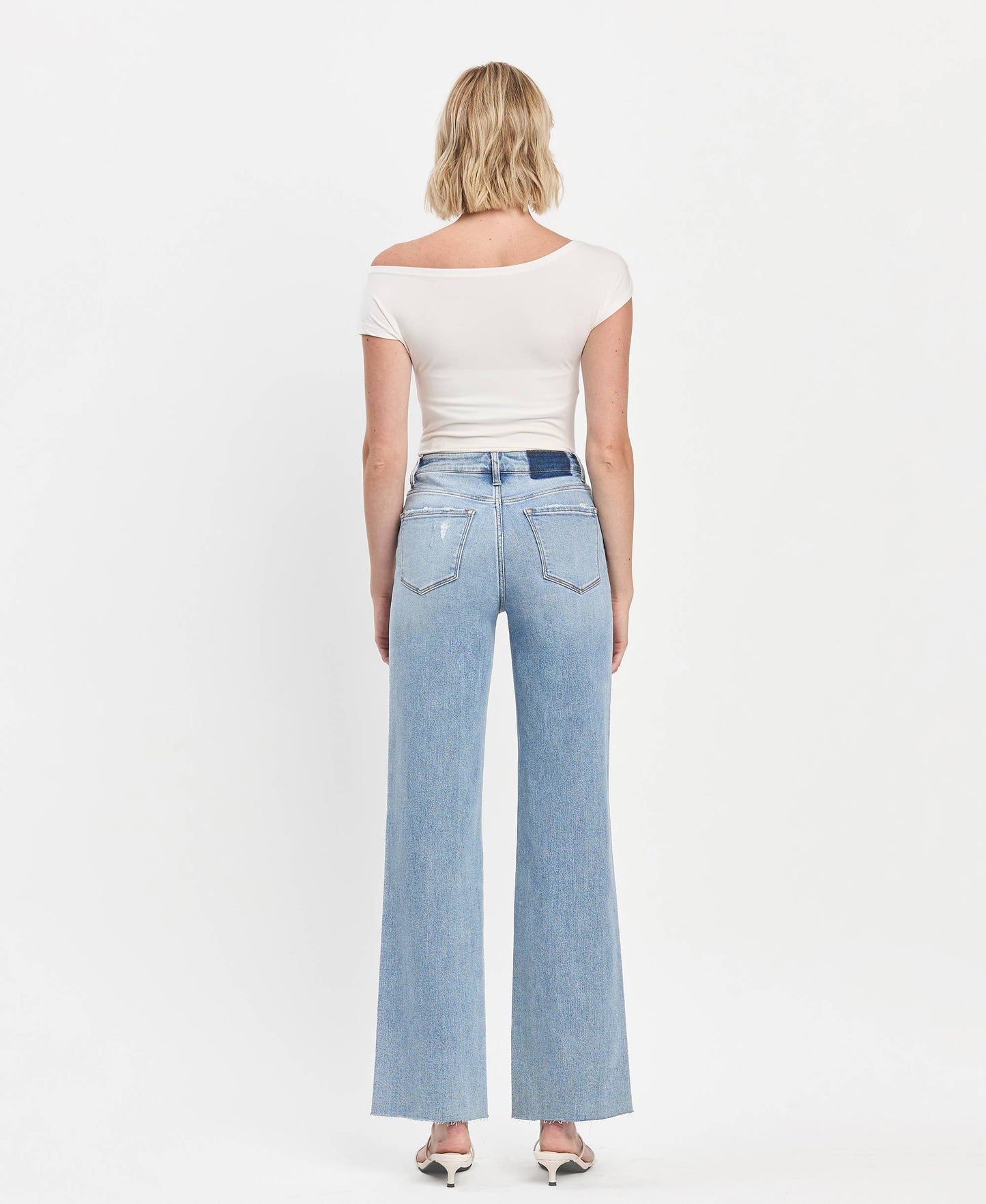 Vervet High Rise raw hem wide leg jeans